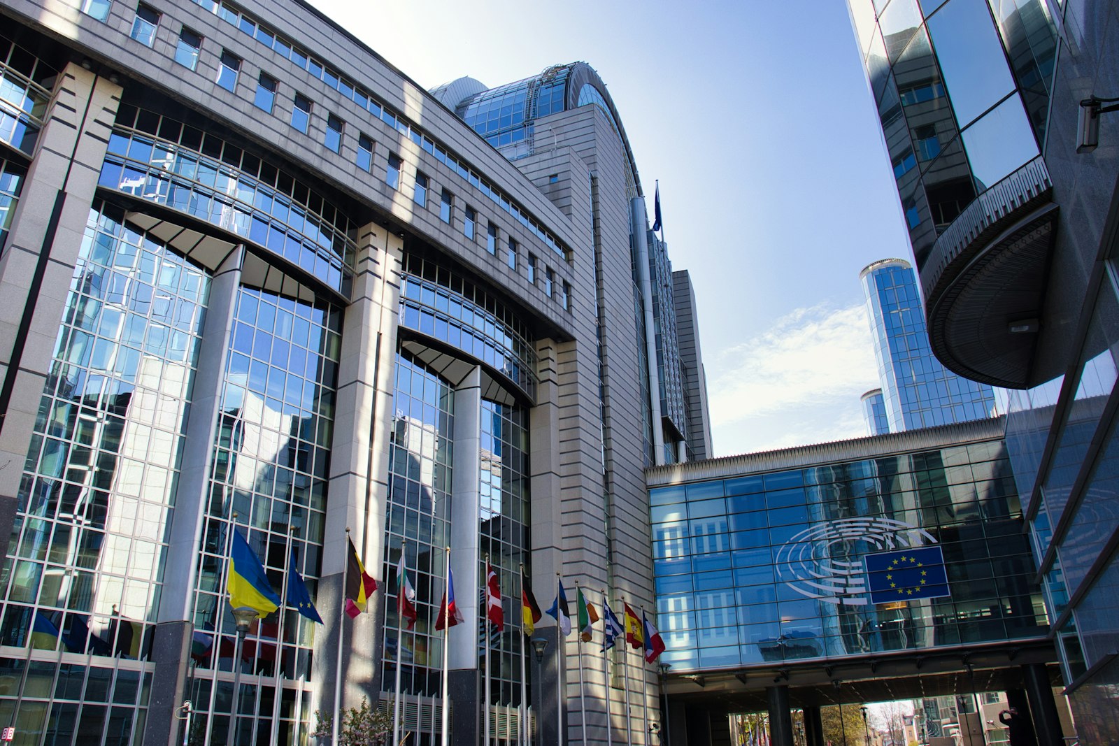 European city skyline representing rising work permit salary thresholds across the EU in 2026.
