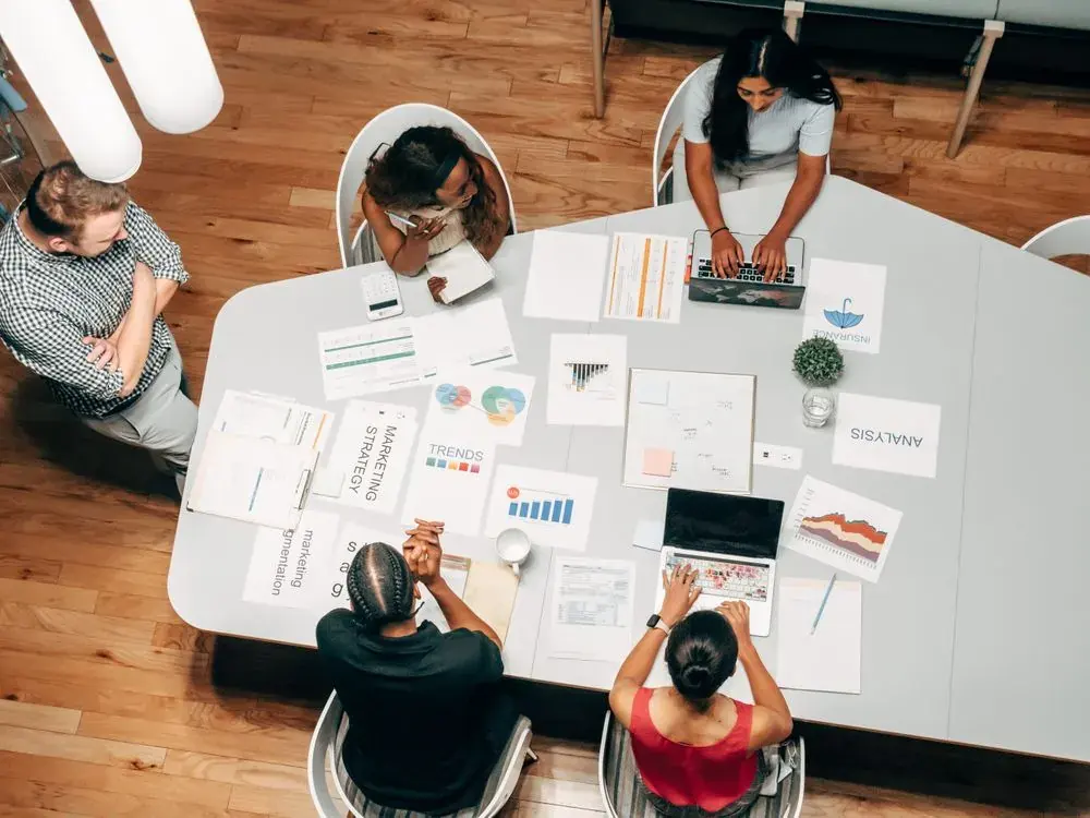 A professional reviewing relocation and mobility documents, representing the difference between global mobility management and relocation management