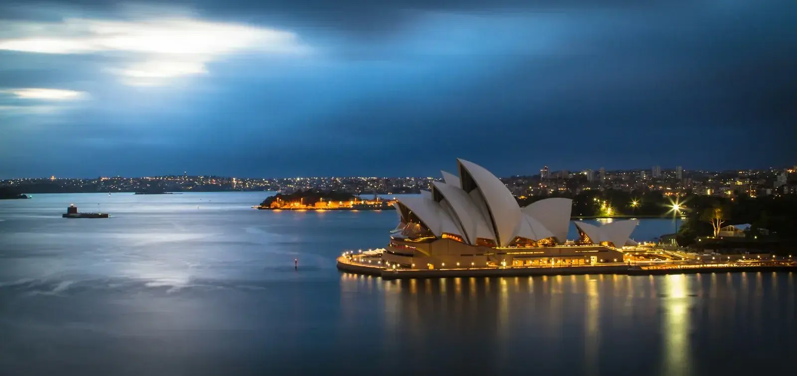 Sydney skyline representing Australia's July 2026 visa fee increases and their impact on mobility budgets.