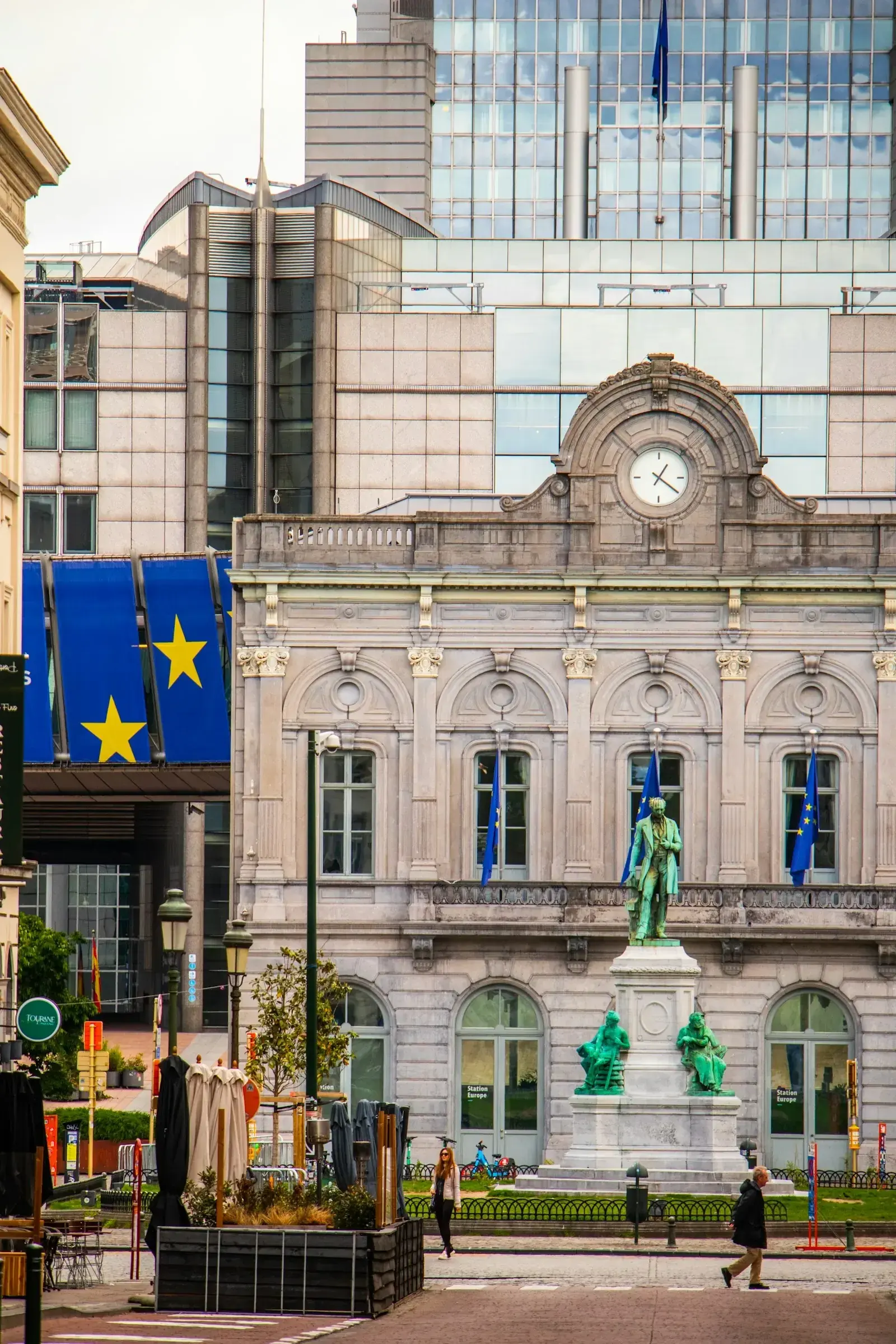 Brussels street scene with European Union flags representing the EU Fair Labour Mobility package and digital A1 certificate proposal