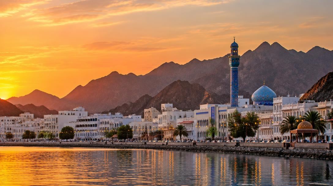 The Muscat coastline and city at golden hour
